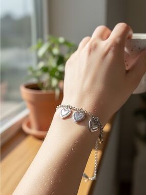 Silver Heart Charm Bracelet with Pink Accents
